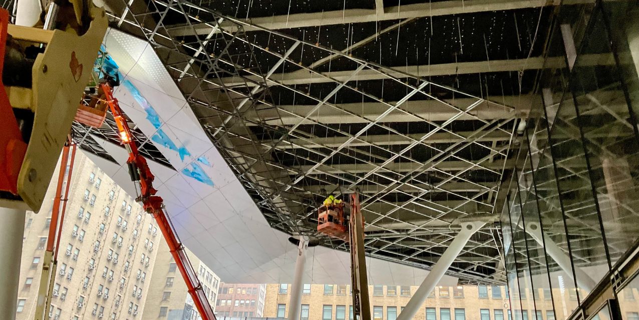 Ceiling work in progress at Penn District