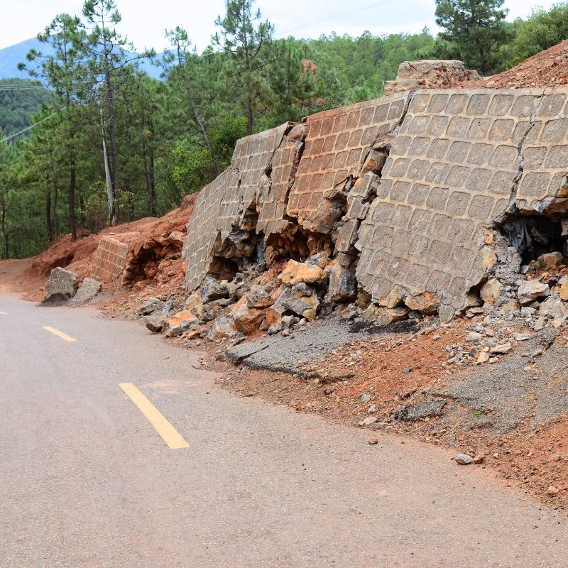 forensics geotechnical engineering collapsed wall along road with significant structural failure