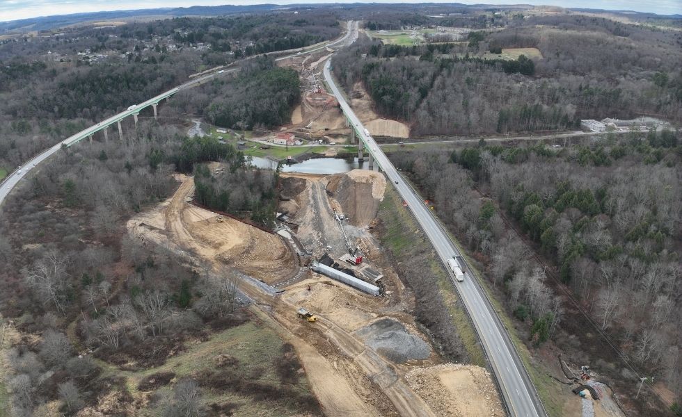 Aerial view of a roadway and bridge infrastructure