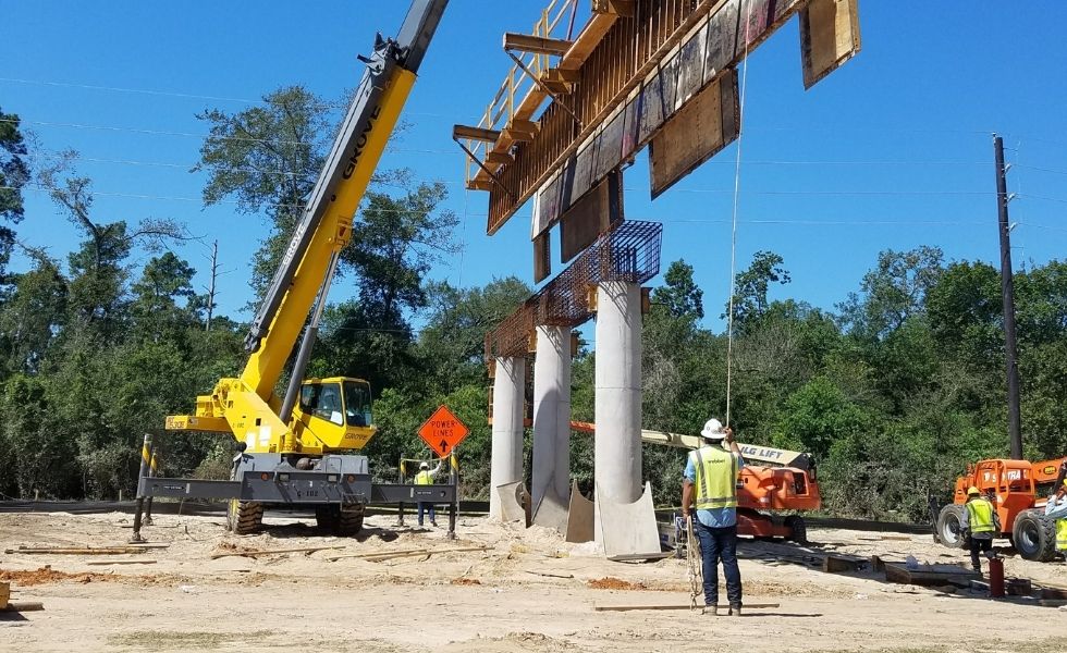 Crane positioning bridge