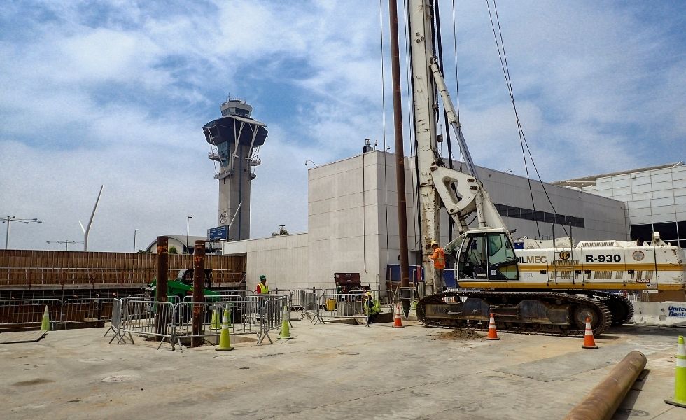 A large drilling rig installing deep foundation piles