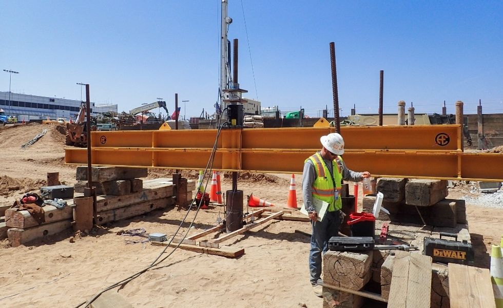 Construction worker performing load testing