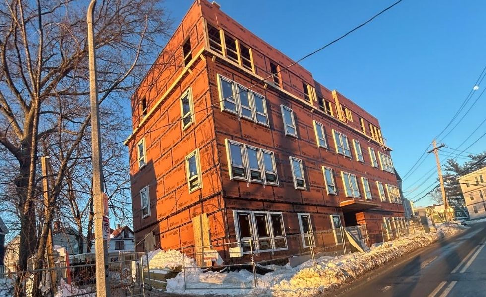 Exterior view of a residential building under construction