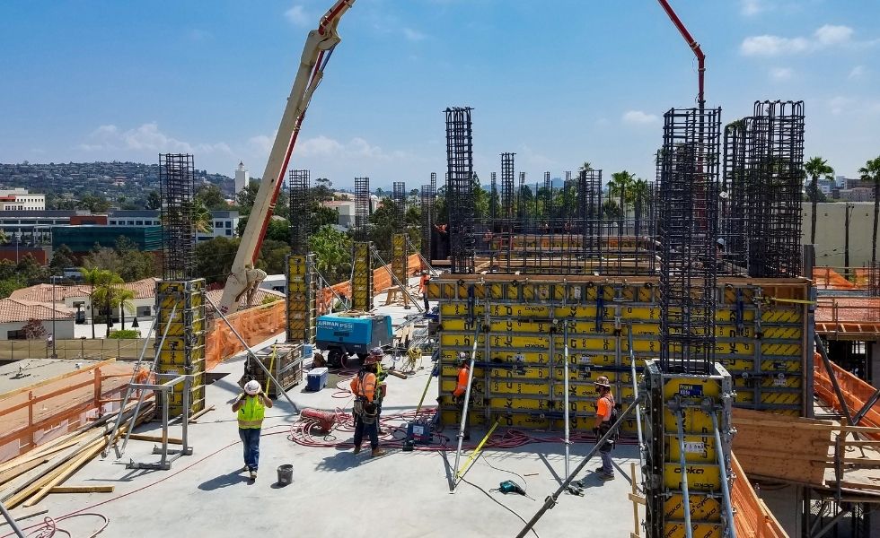 Construction site showing reinforced concrete formwork 