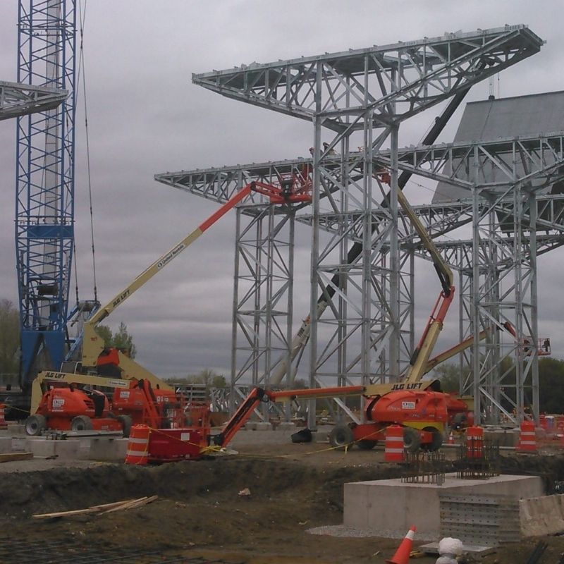 Structural steel installation at the CPV Valley Energy Center construction site in Waywayanda, New York, with cranes and elevated work platforms assembling power plant infrastructure