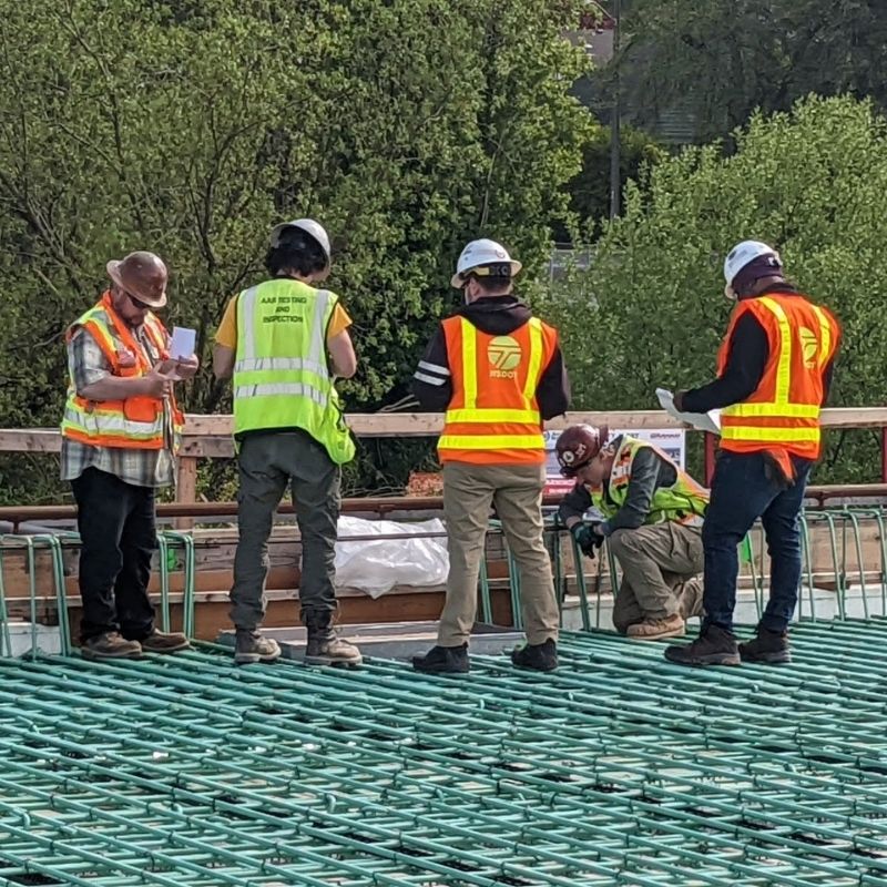 Inspectors review reinforcing steel placement during construction activities for the SR 520 Bridge Replacement and HOV Program.
