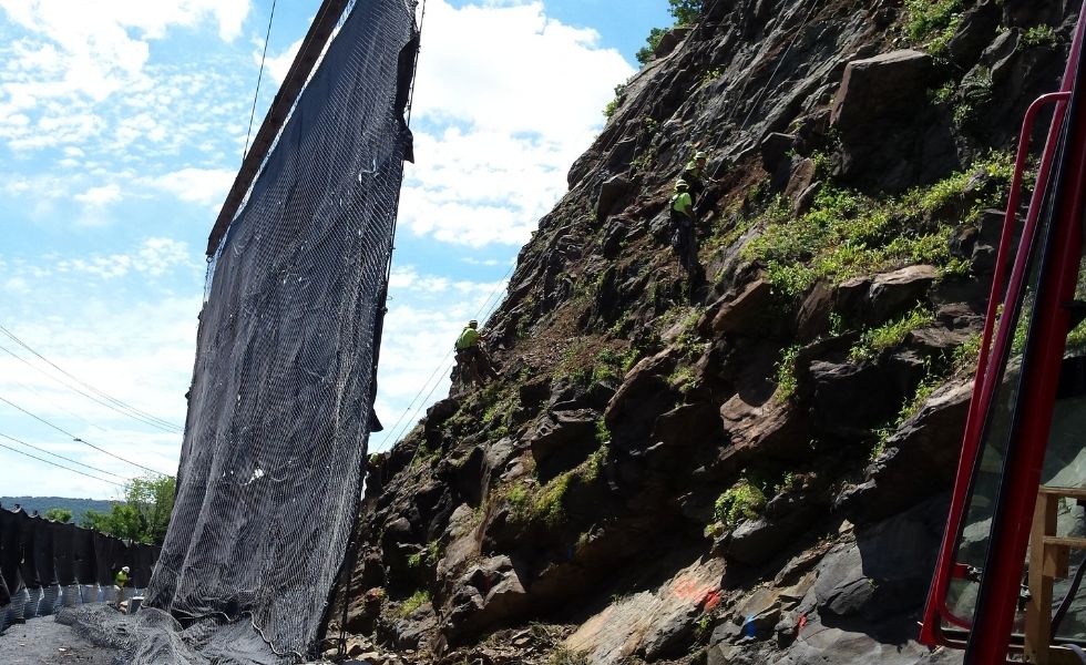 US 11/15 Rock Slope Safety Improvement, PA project: field crews working on the rock face during installation of rockfall protection systems and slope stabilization measures.