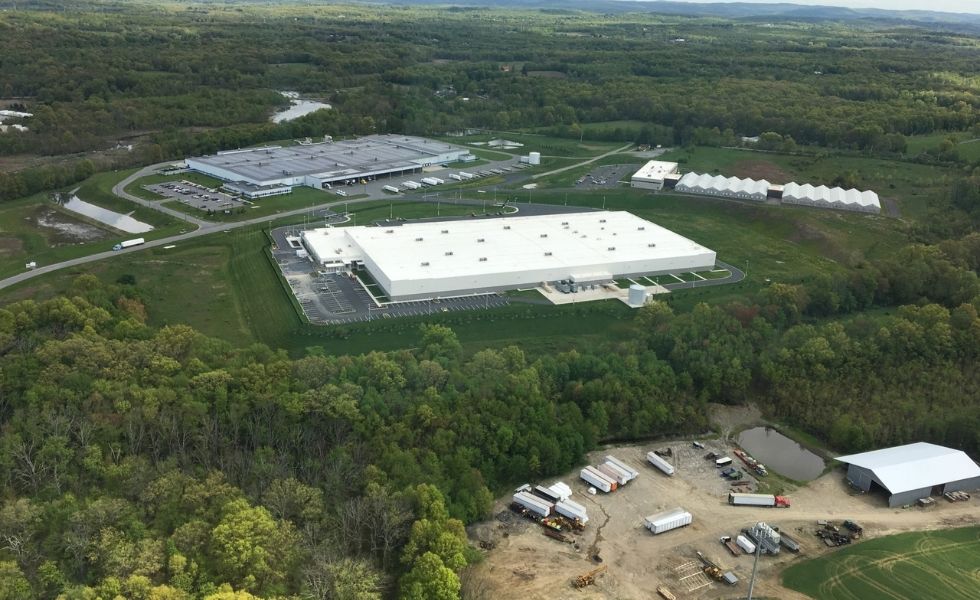 erial view of the Project Blackhawk / McKesson Corporation Distribution Center, showing the completed warehouse facility surrounded by access roads.