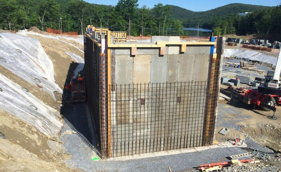 World Headquarters Construction project showing a large concrete structure with reinforcing steel and construction equipment