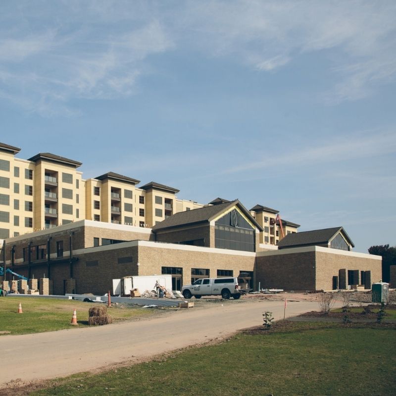 YO1 Wellness Resort & Spa, Catskills, showing the multi-story resort building and surrounding grounds during construction.