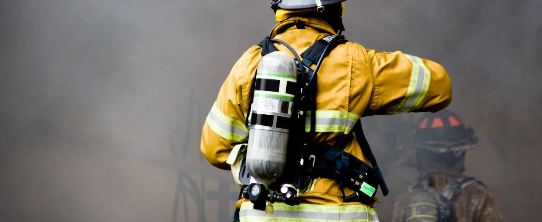 fire fighter entering a building during emergency with BDA system