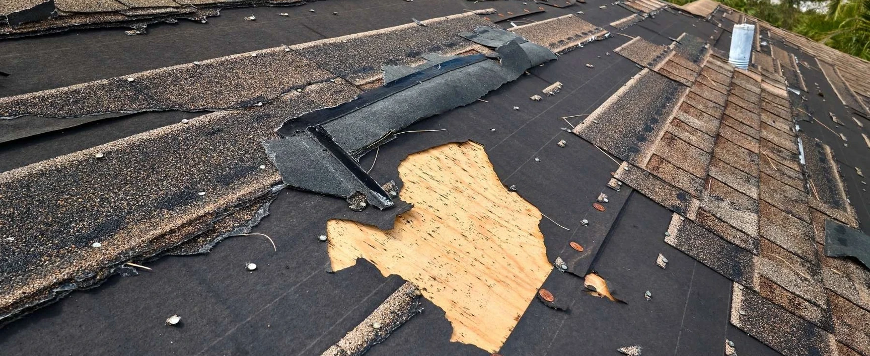 water damage repairs after hurricane on a roof