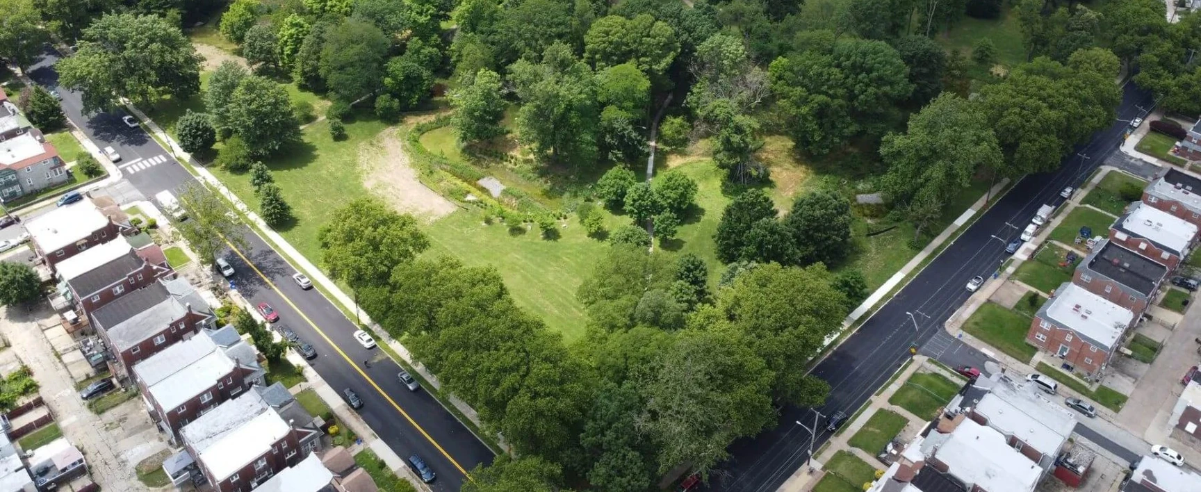Aerial view of Wissinoming Park in Philadelphia, Pennsylvania, showing green space surrounded by residential streets and neighborhoods.