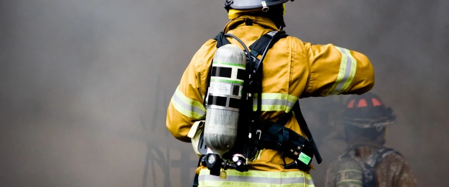 fire fighter entering a building during emergency with BDA system