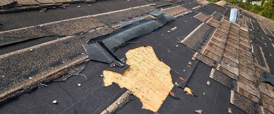 water damage repairs after hurricane on a roof