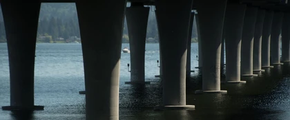 View of the bridge support piers beneath the SR 520 Bridge Replacement and HOV Program crossing over Lake Washington