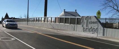 41st Street Bridge with a newly paved roadway, pedestrian walkway, and protective side barriers.
